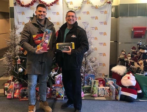 Ken and Rob Donating toys to CHFO Toy Drive for the Childrens Hosiptal in Ottawa