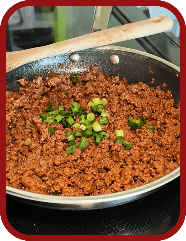 gochujang-ground-beef-rice-paper-roll-filling Lean ground beef cooked with garlic and gochujang for homemade rice paper rolls.